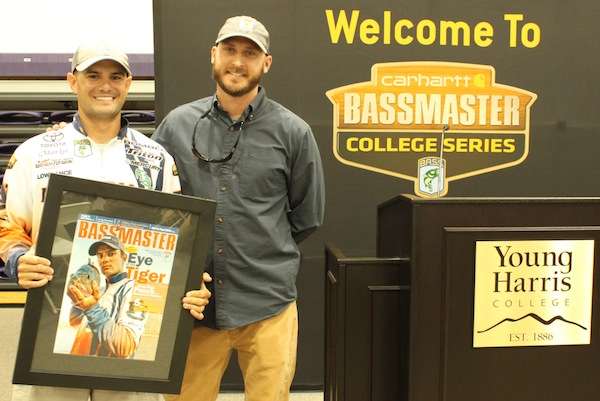 <p>Spiro awarded Matt Lee with a framed copy of his Bassmaster cover.</p>
