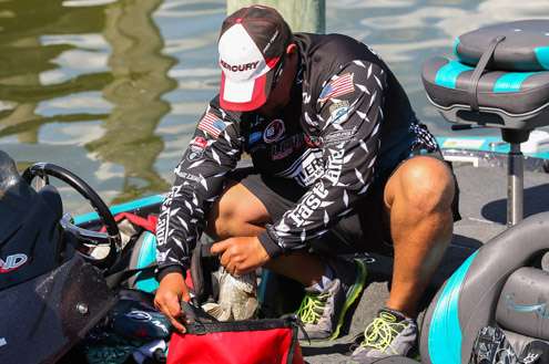 Chris Lane loads up his big bass of the day.  Lane is in 4th place after Day Two with 39-10.  