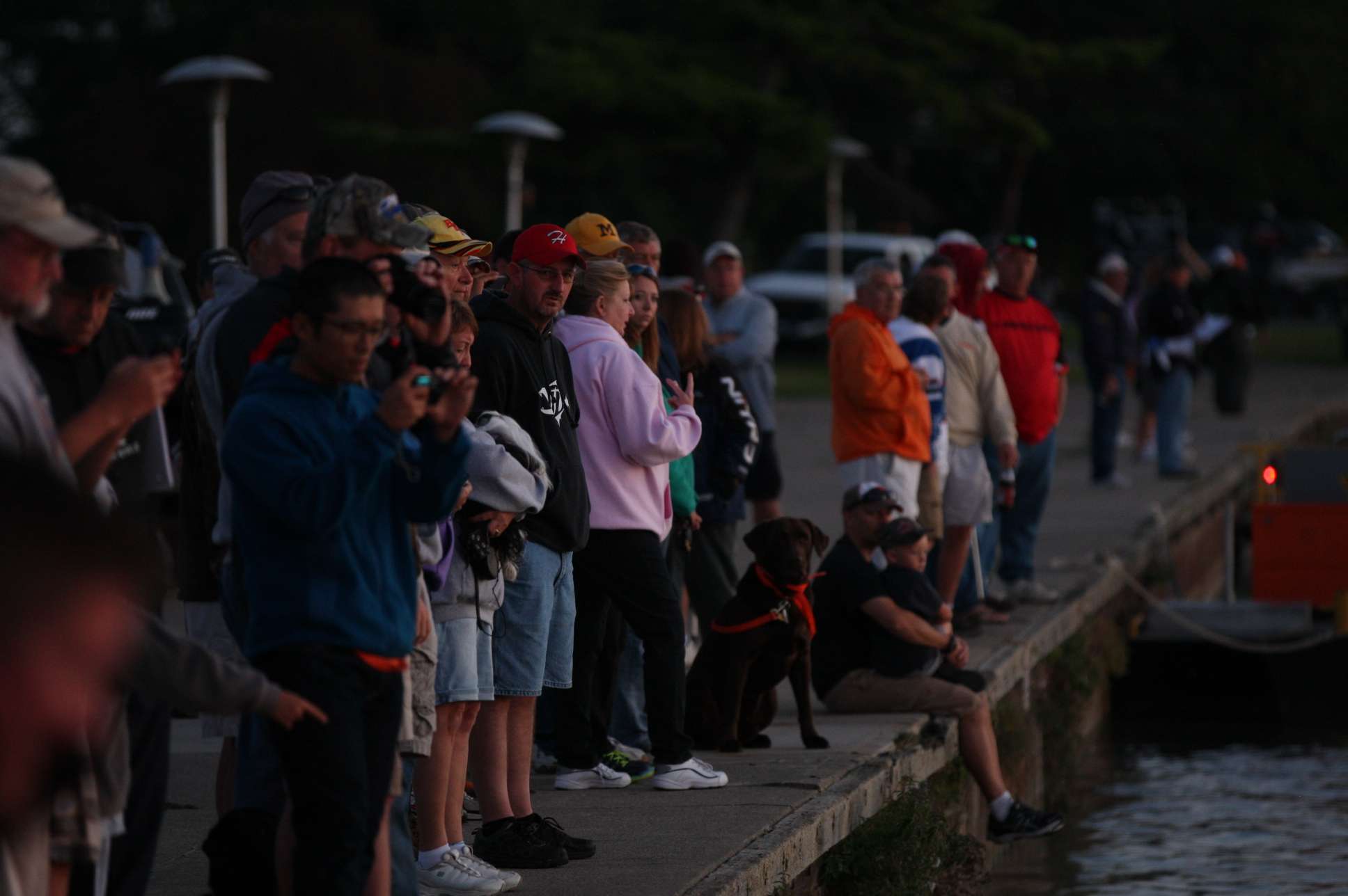 Fans line up to see their favorite anglers launch. 