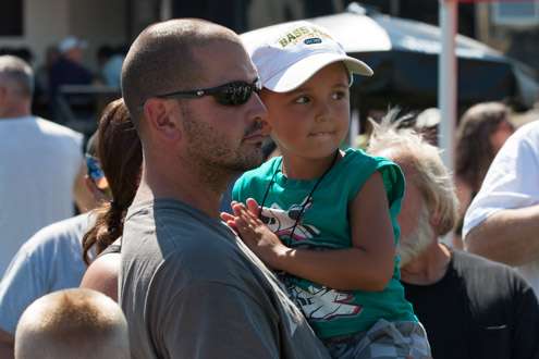 This young angler is keeping a close eye on the main stage.