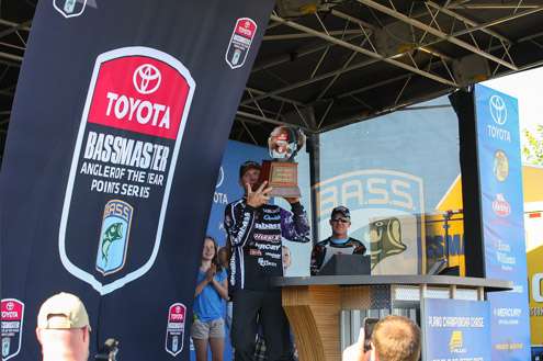 Martens hoists his trophy up.