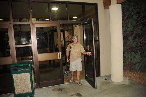 Bill Skowronski leaves Cedar Shore Resort with his rods ready.