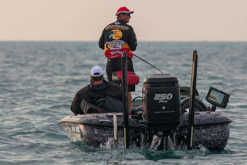 <p>Kevin VanDam, who is currently in third place for the Toyotoa Bassmaster Angler of the Year race, takes a moment to look over his shoulder as other anglers begin to move very early on Day One.</p>
