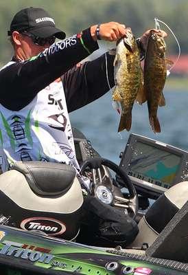 Parker Ferguson kisses the catfish that placed her in 2nd in the Catfish Division on Sunday.