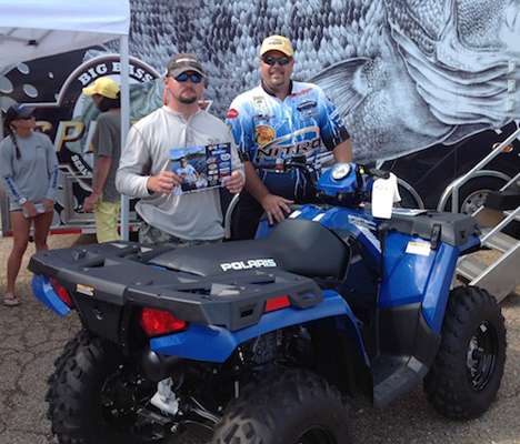 Jeffery Archie, winner of the Elimination Drawing, with his brand new Polaris Sportsman 400.