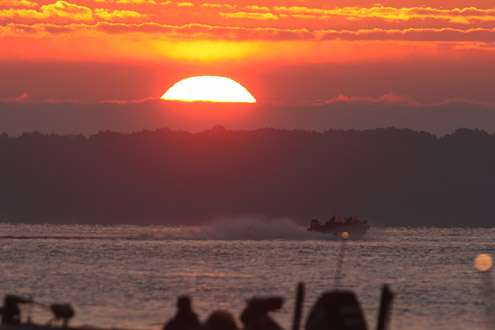 <p>Partly cloudy skies reveal a gorgeous sunrise on Day Two of the Bass Pro Shops Northern Open #2.</p>
