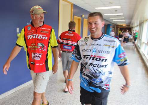 Boyd Duckett and Randy Howell stroll to the briefing together. 