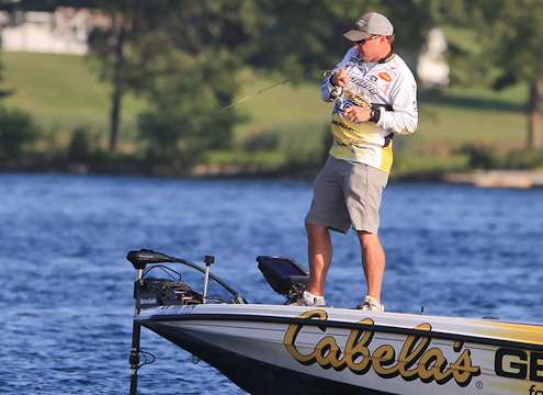 <p>Mike McClelland sets the hook on a fish. </p>
