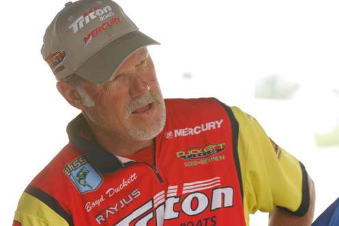 Boyd Duckett chats with other anglers.