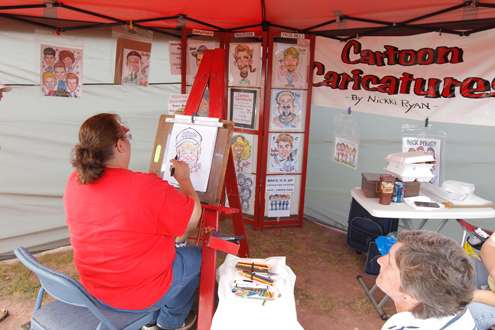 <p>Everybody enjoys something at the venue, like having their caricatures done.</p>
