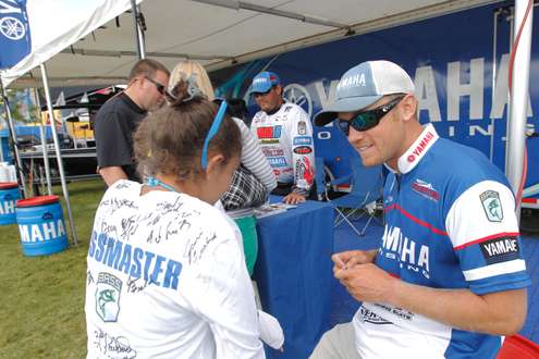 <p>Jared Miller and Cliff Crochet meet with fans at the Yamaha booth.</p>
