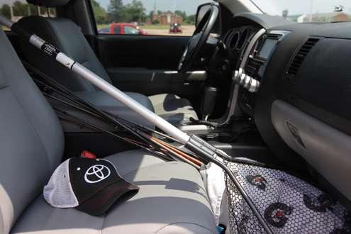 <p>Rods, a landing net and his Toyota hat are close at hand in the front of the Tundra.</p>
