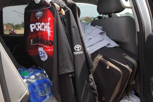 <p>Jerseys, jackets, a suitcase and more are stored in the back seat.</p>
