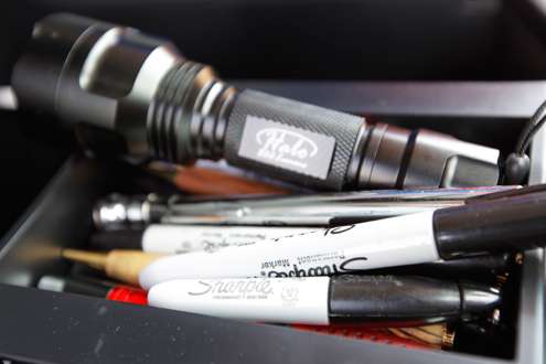<p>Elite anglers always need a Sharpie. Kurt has several ready to go for autographs. </p>
