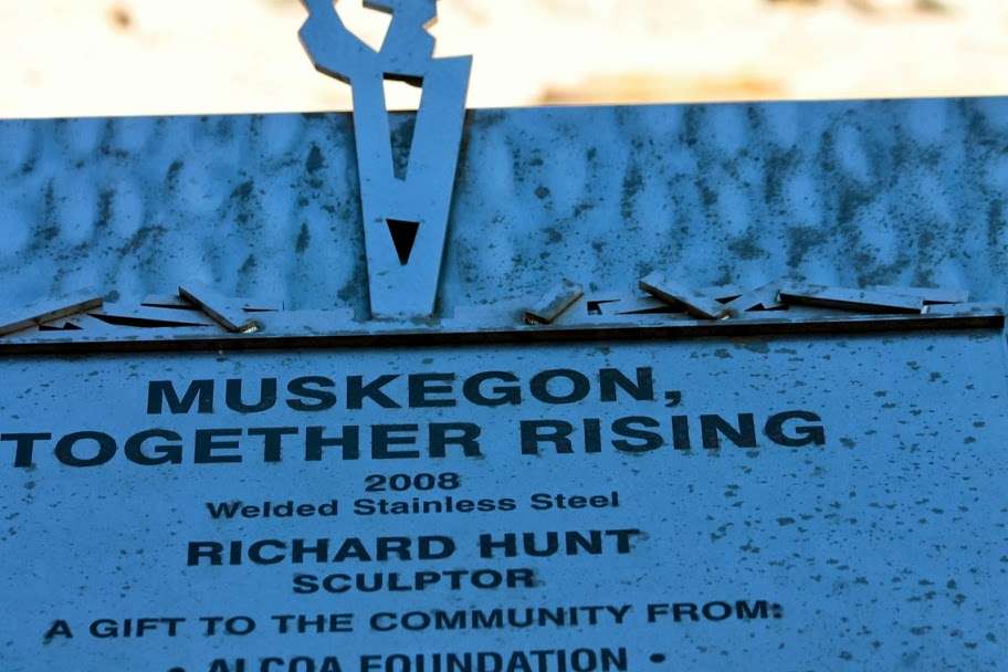 ...is what it says down below...Muskegon Rising...rising by...
