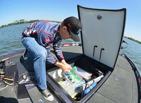 <p>In the main center storage area, Hawk keeps a variety of soft plastics as well as his throwable PFD (you do have one in your boat, right?).</p> 