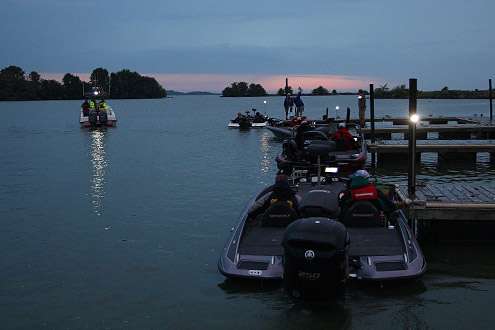 The first flight of competitors holds at the dock while awaiting the official start of Day One.