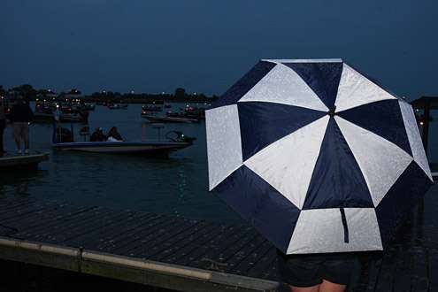 A slow, steady rain kept spectators under cover on Day One.