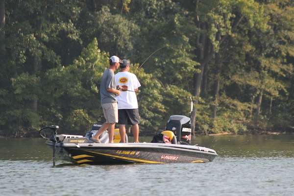 Darrell Gleasen and Kevin Jeane ignite a school of small bass. 