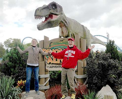 Val and I pose in front of Tyrannosaurus rex outside the gates at Cedar Point.