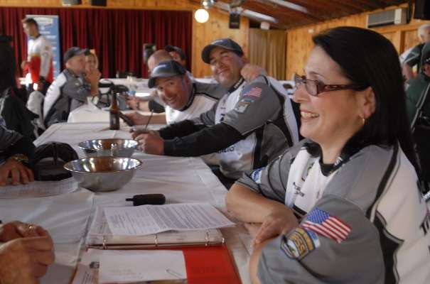 Sylvia Morris, president of the Connecticut B.A.S.S. Nation, has a good time joking with her team while waiting for the briefing to begin.