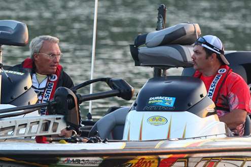 Roland Martin speaks with his co-angler before Day One take-off.