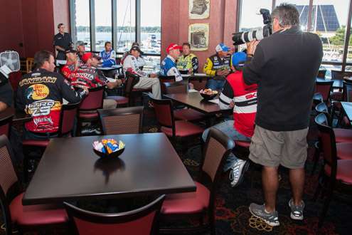 B.A.S.S. Photographer James Overstreet takes a moment to get some shots of the Elite All-Stars prior to their meal.