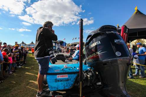 B.A.S.S. photographer James Overstreet shoots Hank Cherry on his way to the stage.