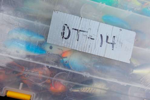 He uses tape as labels, easily changing what each bin holds. 