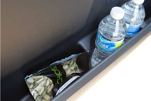 Some snacks are found in the door pocket. 
