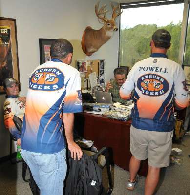 The three Auburn anglers spend time in the office of James Hall, Bassmaster Magazine editor. The foursome talk fishing and hunting.