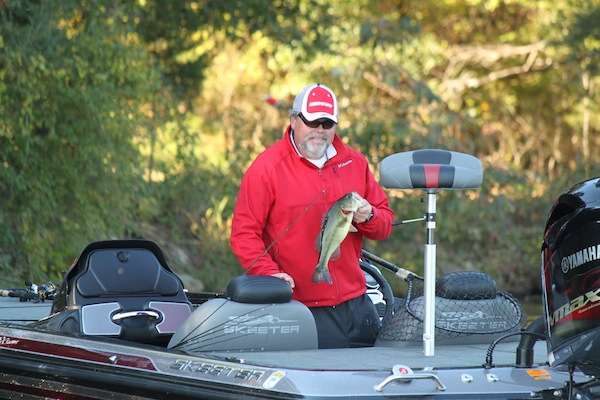 A quick grin from Jim as he loads his second keeper into the well.