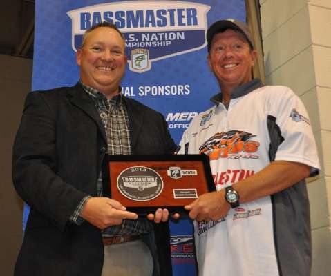 Each competitor who earned a berth in the 2014 Bassmaster Classic was then presented with a division winner plaque. Tim Johnston of Montana was the first one up. He won the Western Division.