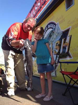 Bob with Isabella Stroman showing off her Catfish on Day 3.