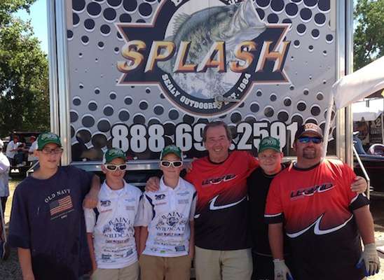 Bob Sealy and Josh Neal take a break to take a picture with the Fish Runners (Rains High School Fishing Team).