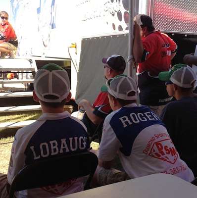 Justin Lobaugh and Trey Rogers with the Rains High School Fishing Team watch the final awards ceremony.