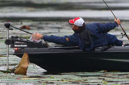 Avery reaches to get a grip on his line. 