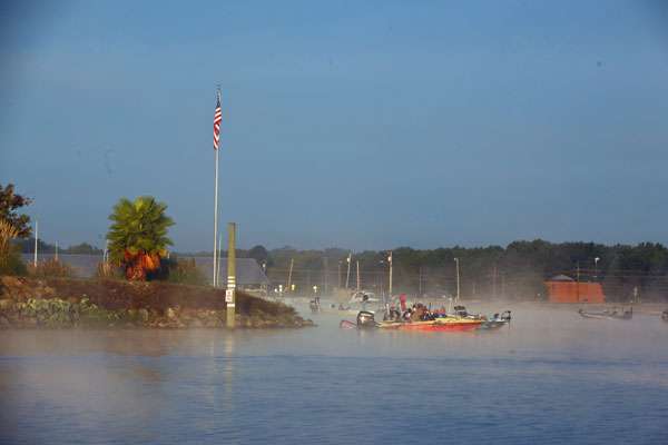 The fog shows signs of lifting and the American flag comes into view. 
