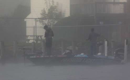 Brent Ehrler stopped to fish a few boat docks in the fog. 