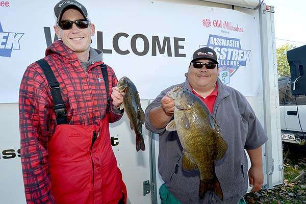 Chia Vang (right) and Jeff Bye clinched victory and $2,000 with 7.46 pounds. Their catch was anchored by a rotund 5.42-pound smallmouth.