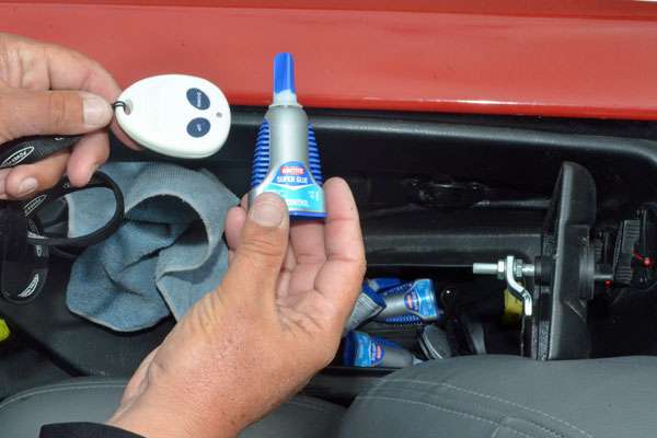 <p>In the little glove box is super glue and a Power-Pole remote he uses a lot when guiding.</p>
