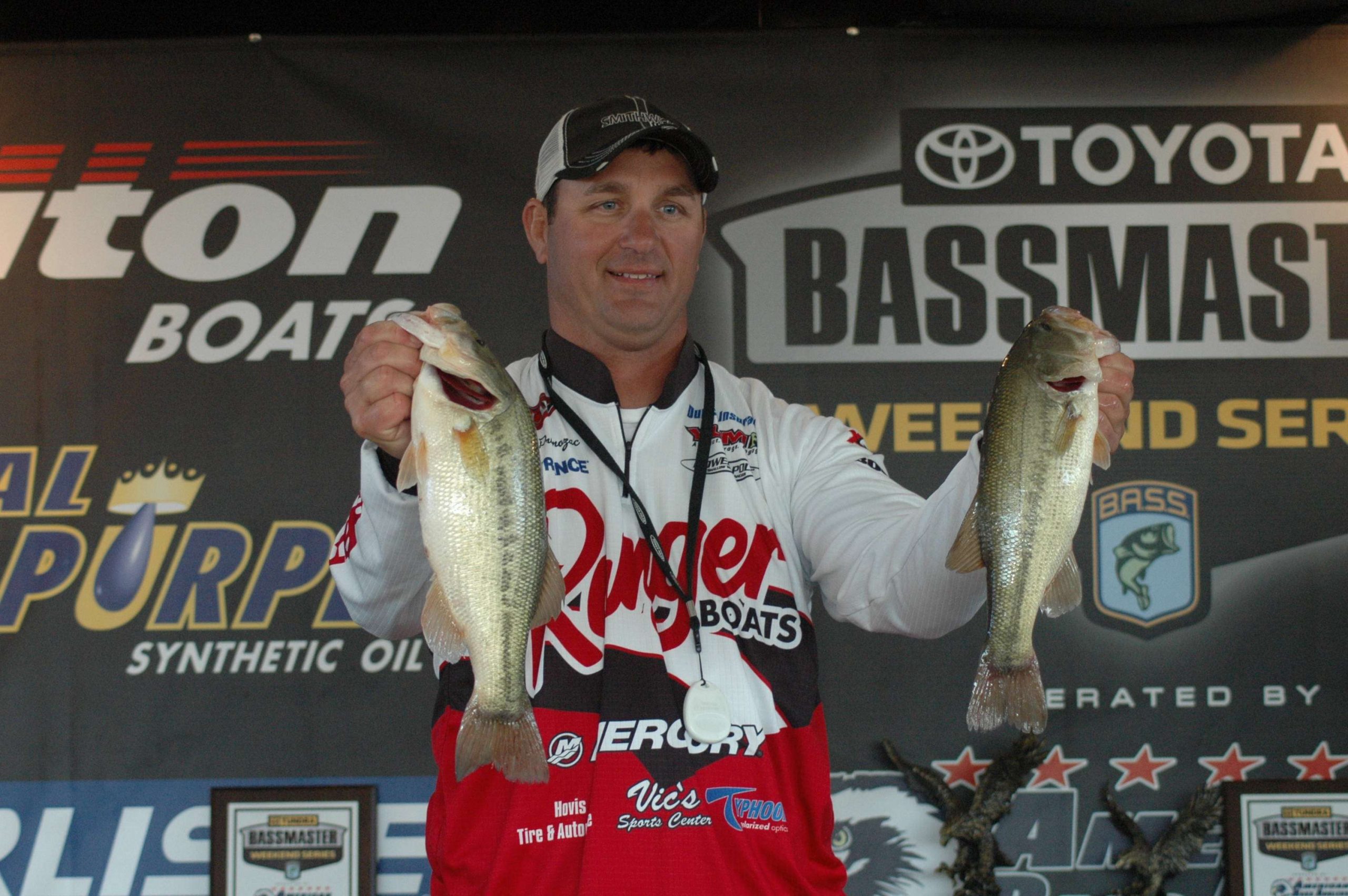 Ohio angler Nick Prvonozac weighs a catch that will reward him with sixth place at the Toyota Bassmaster Weekend Series National Championship. 