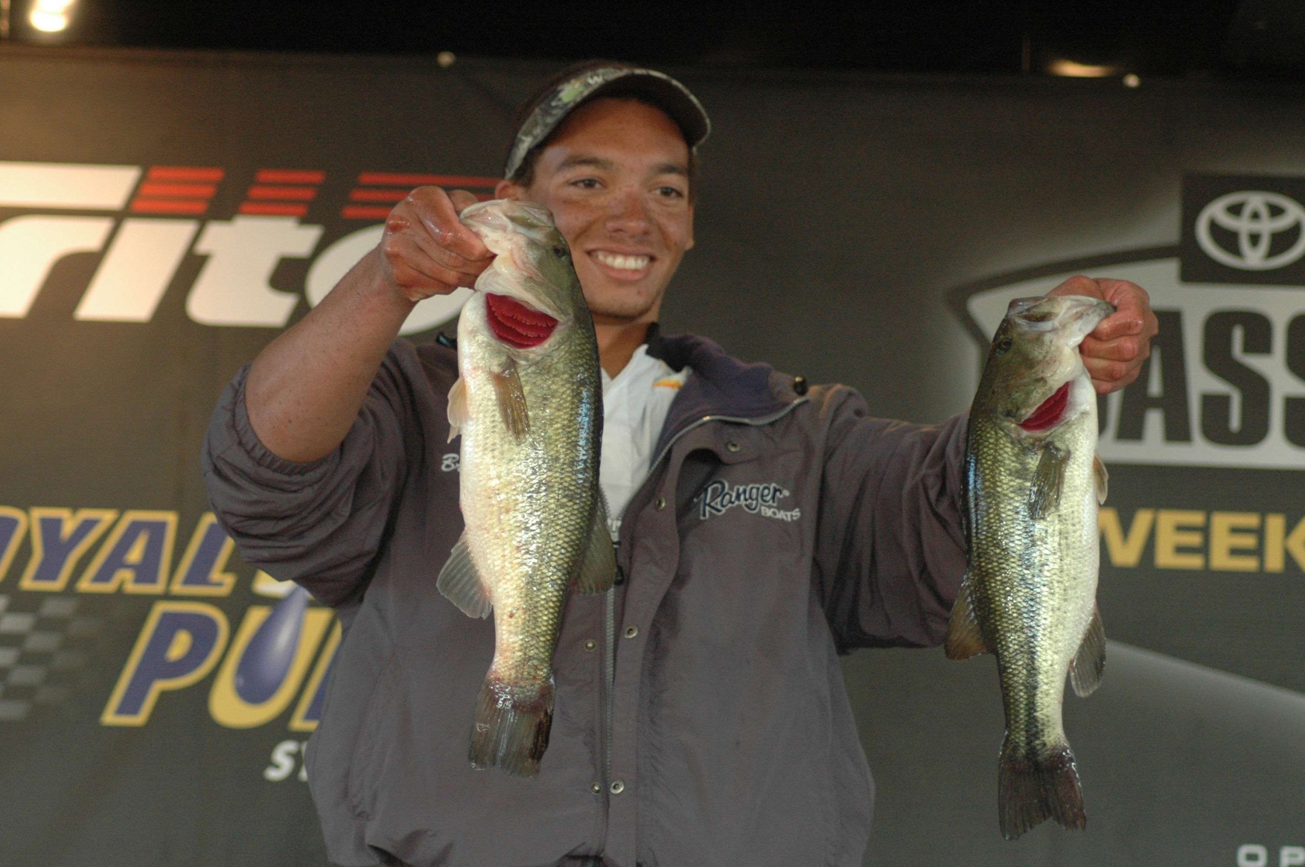 Brett Stearnes poses with the fish that rewarded the 19-year-old Missouri angler with the co-angler win at the Toyota Bassmaster Weekend Series National Championship.
