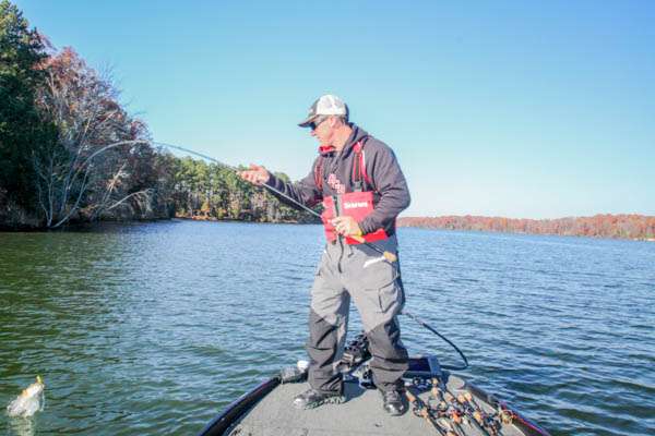 1:50 p.m. Myers prepares to swing aboard another keeper bass that hit his jerkbait.