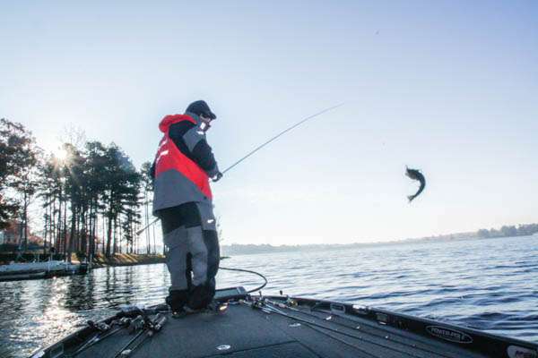 8:10 a.m. Myers swings aboard a bass that ate his Zoom Super Fluke on a channel bank.