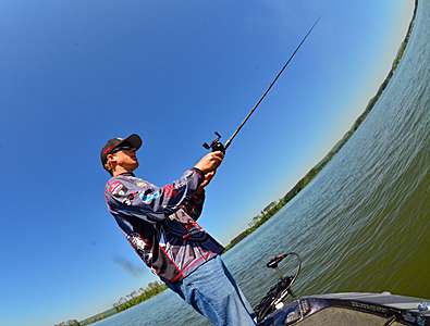 <p>He fires a cast across a grassy point with a Duo Realis Vibration lipless crankbait.</p>
