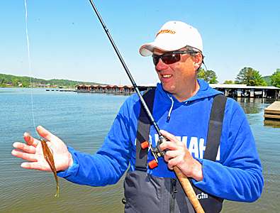 <p>Guntersville guide and Hartselle, Ala., native Brent Crow shows off his secret bed fishing bait: a magnum Zoom Fluke in watermelon red. Crow also guides on lakes Pickwick, WIlson and Wheeler. He can be reached at 256-466-9965 or <a href=