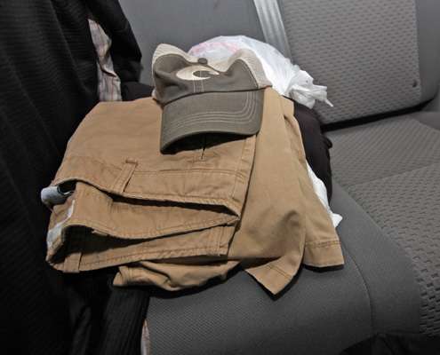 <p>He stashes an extra set of clothes behind the driver's seat.</p> 