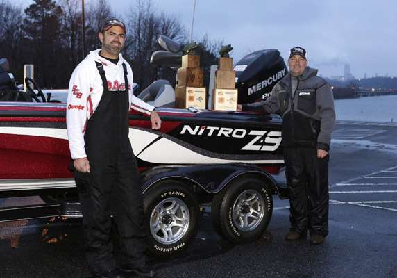 Ryan Newman Foundation Charity Fishing Tournament  winners Brandon Brickweg (left) and Nick Miller (right) with their trophies and 1st prize Nitro Z9 boat . 
