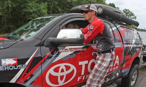 <p>John Crews hitches a ride up the ramp with Becky Iaconelli. Backing and loading is just part of the deal, sometimes they run shuttle services.</p>
